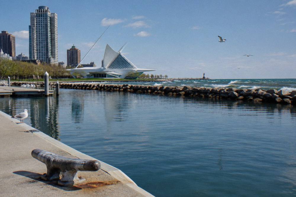 Breakwater and calm inner harbor water near the Milwaukee lakefront on a clear day