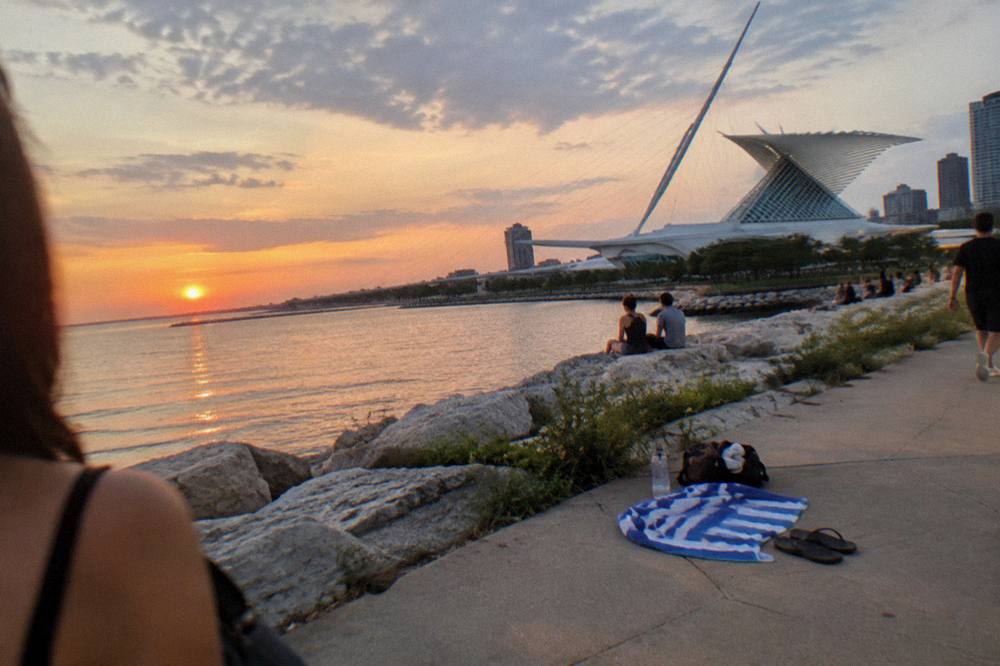 Sunset light on the Milwaukee lakefront with calm summer water